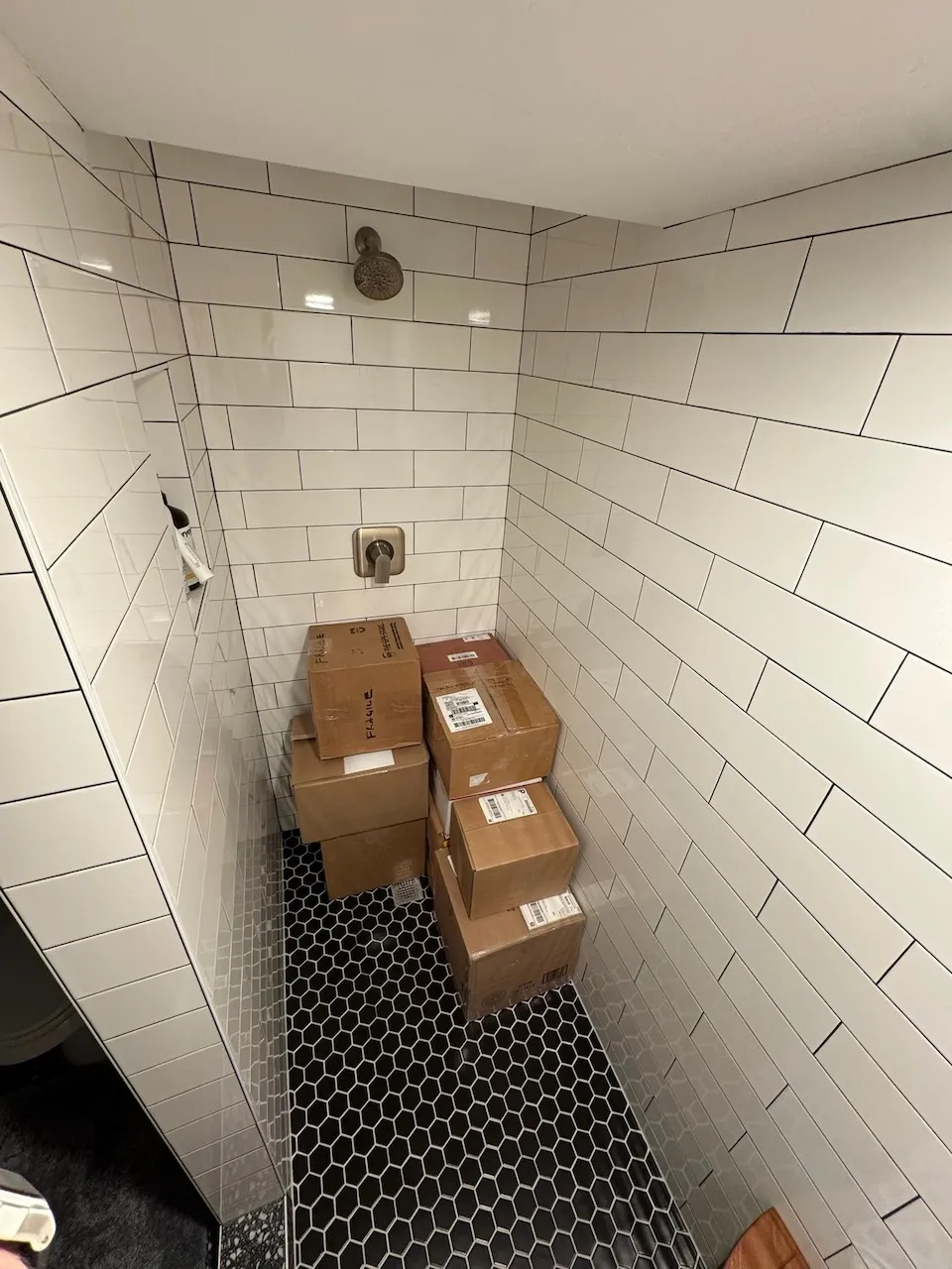 The basement shower, starting to fill