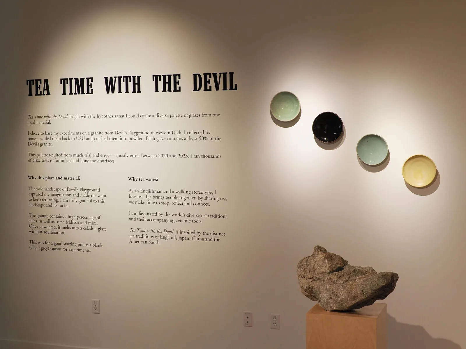 The statement wall, next to a boulder of the granite that caused all this