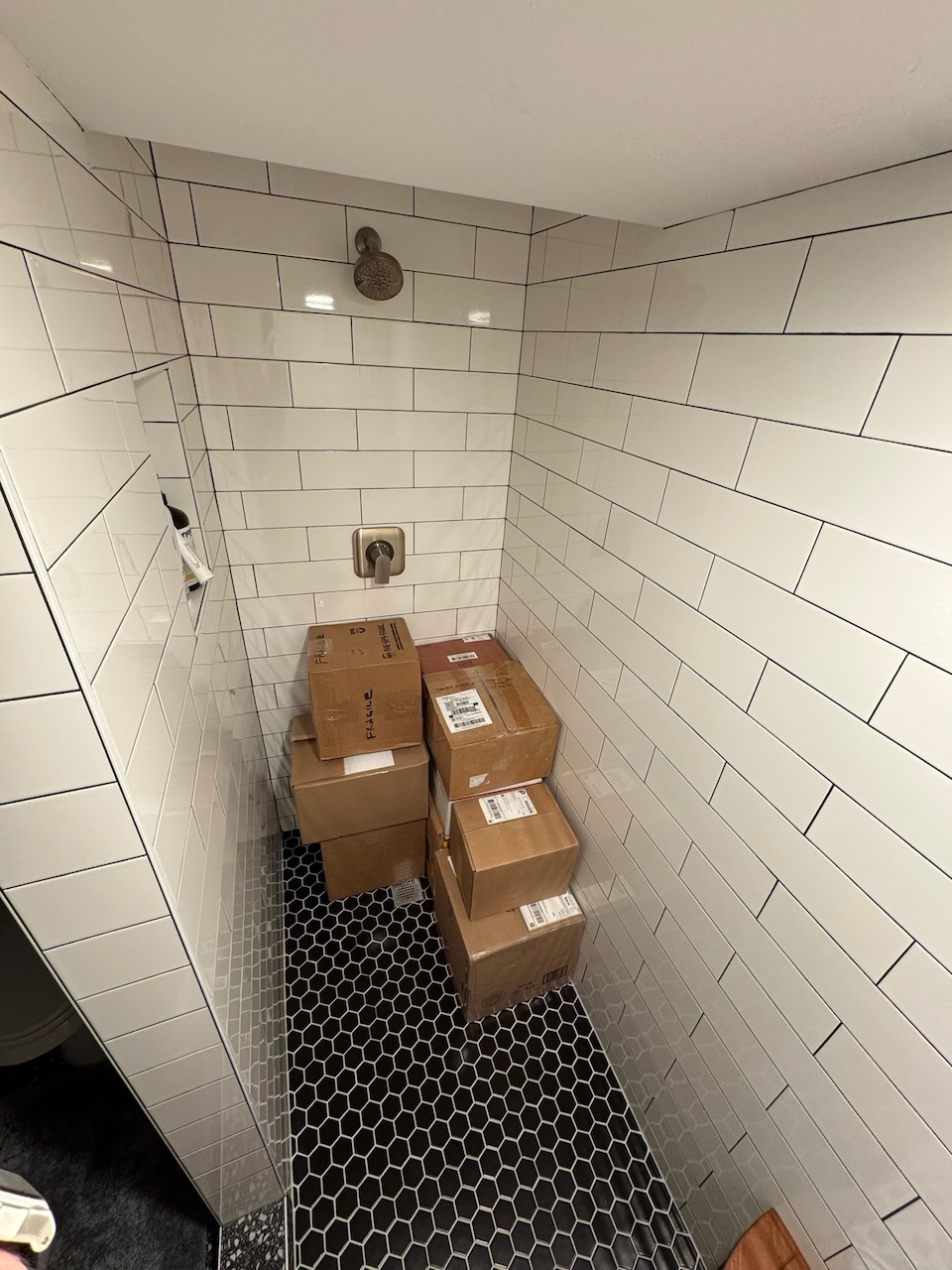 The basement shower, starting to fill
