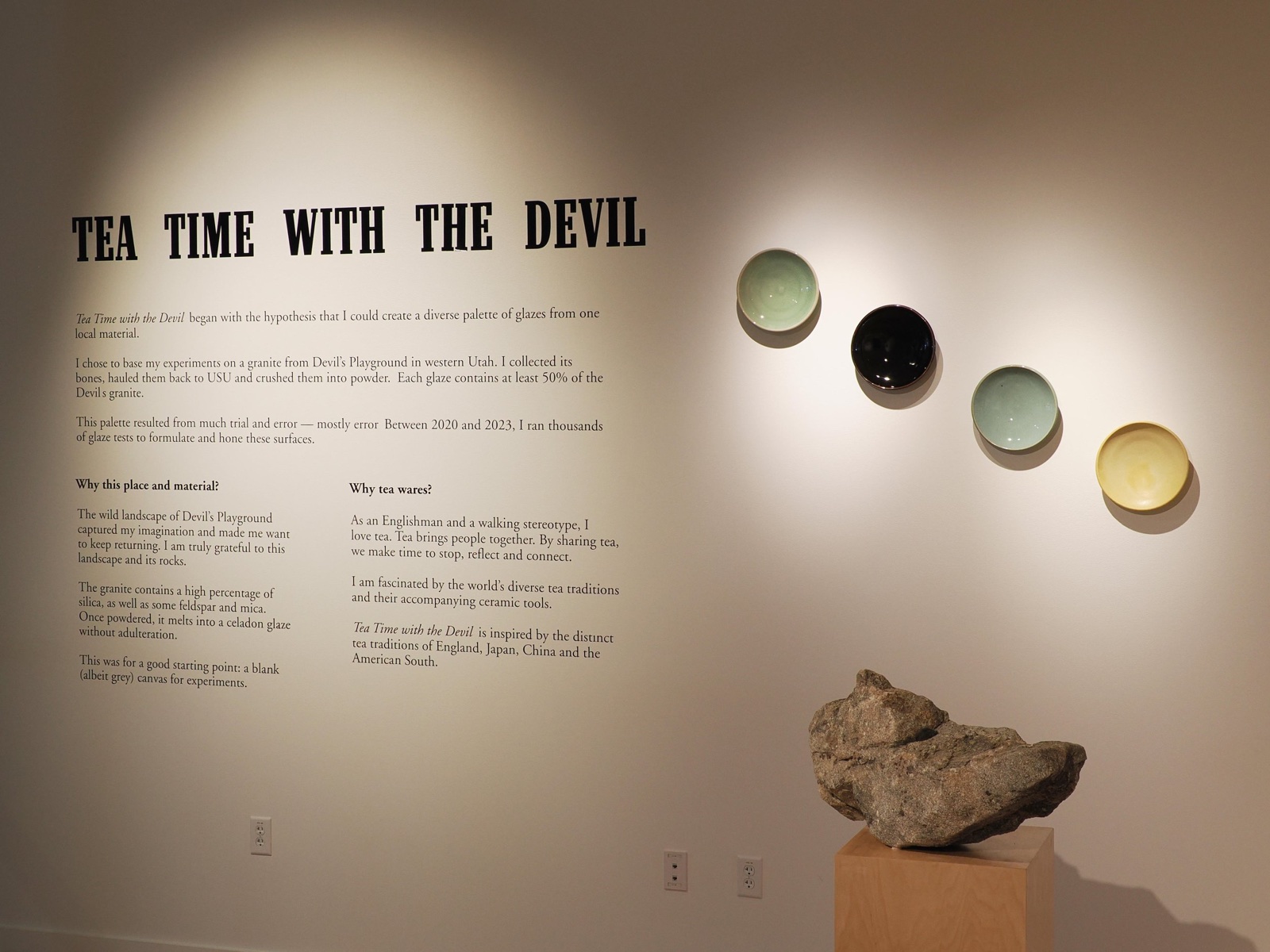 The statement wall, next to a boulder of the granite that caused all this